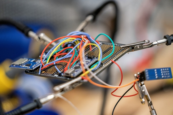 The image contains electrical chip and conductor.