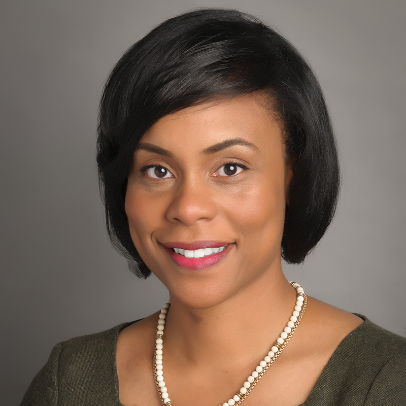 Headshot of Nadine Dechausay.