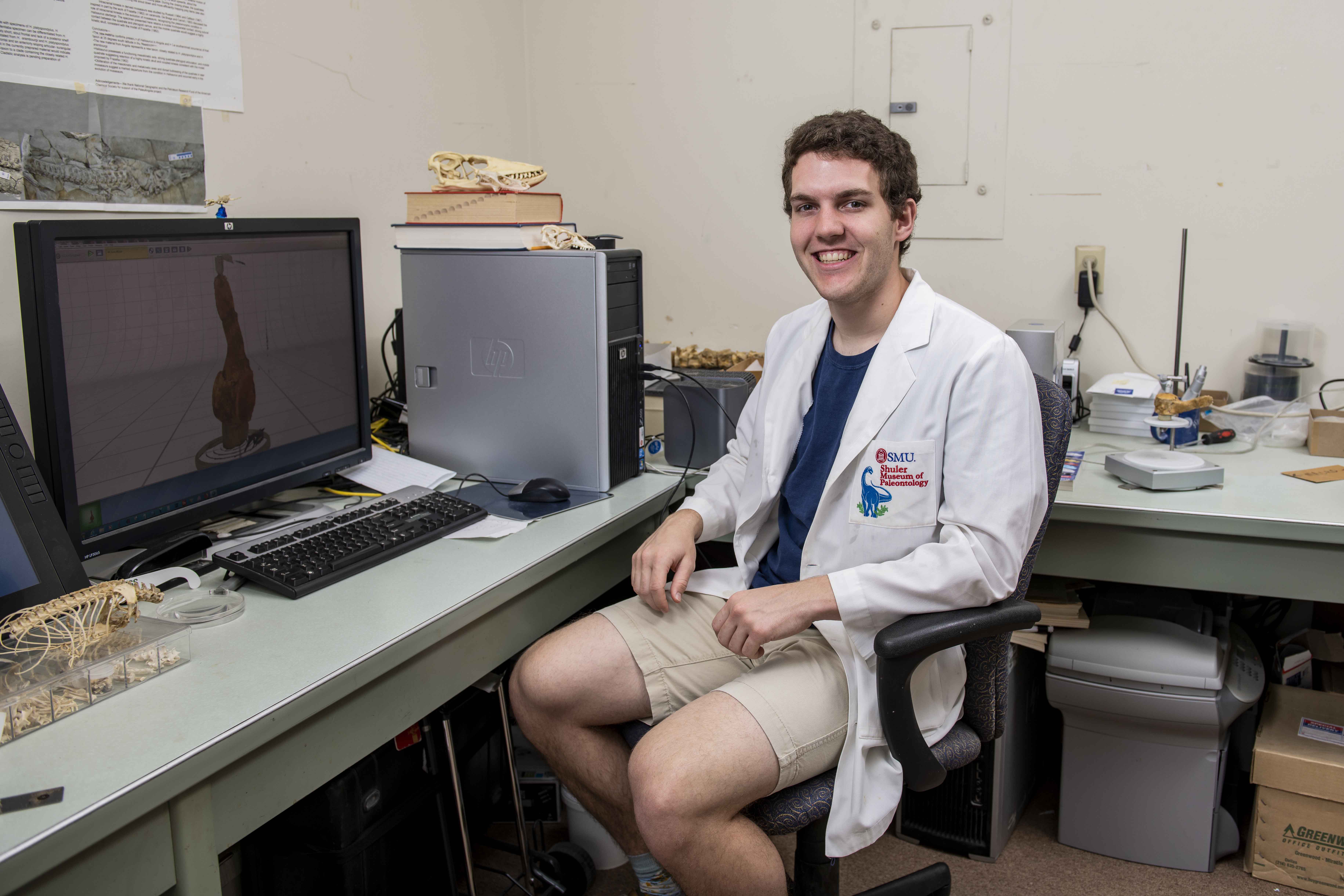 student in lab coat