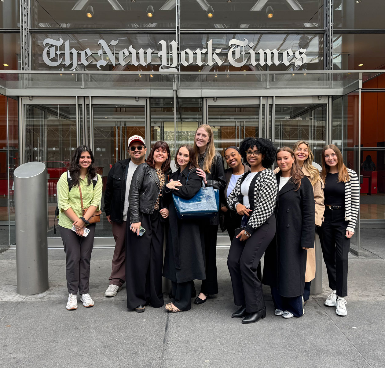 Students pose outside of The New York Times offices in NYC.