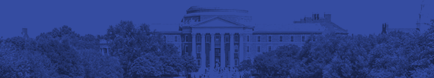 Dallas Hall surrounded by trees
