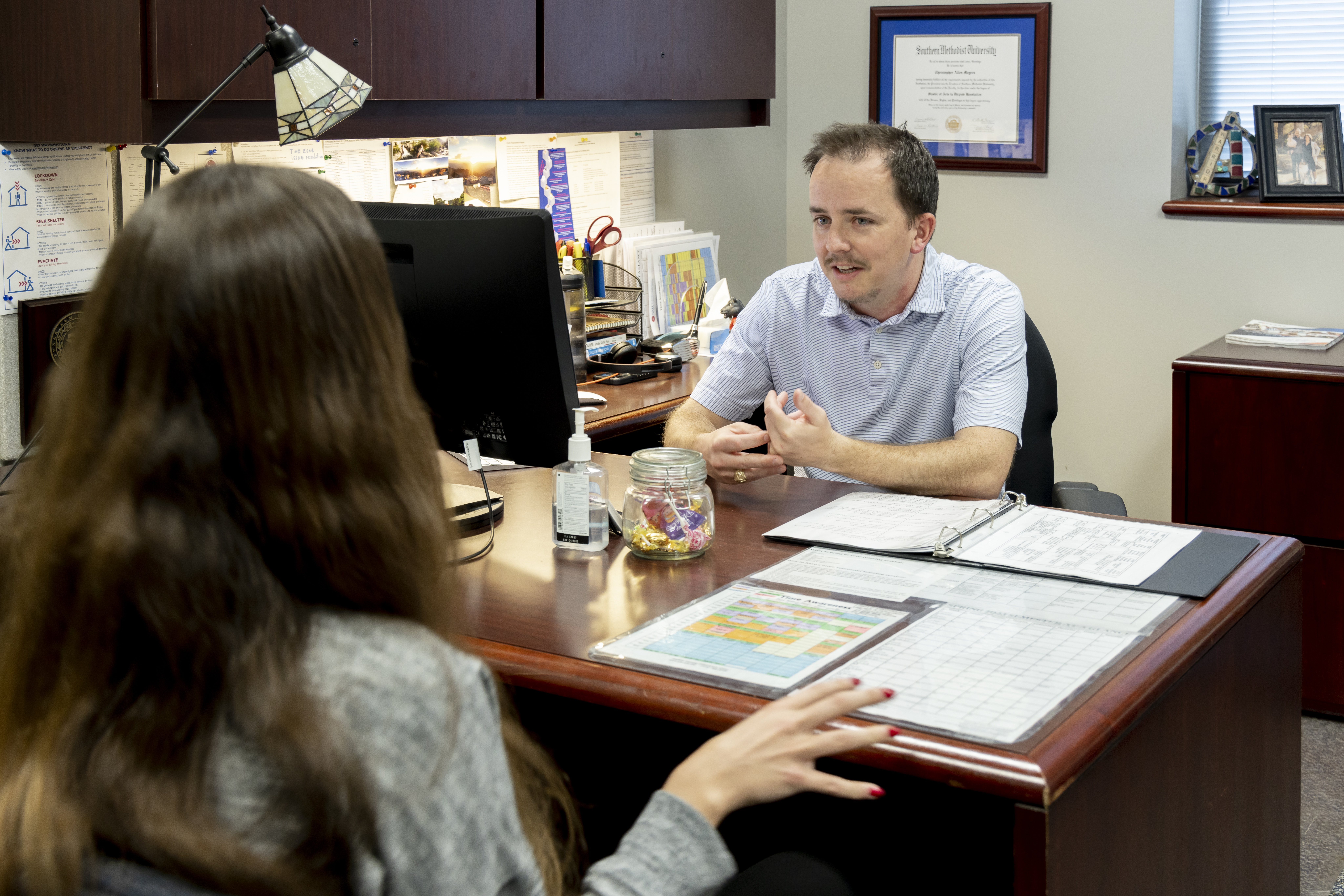 Someone providing guidance to a student