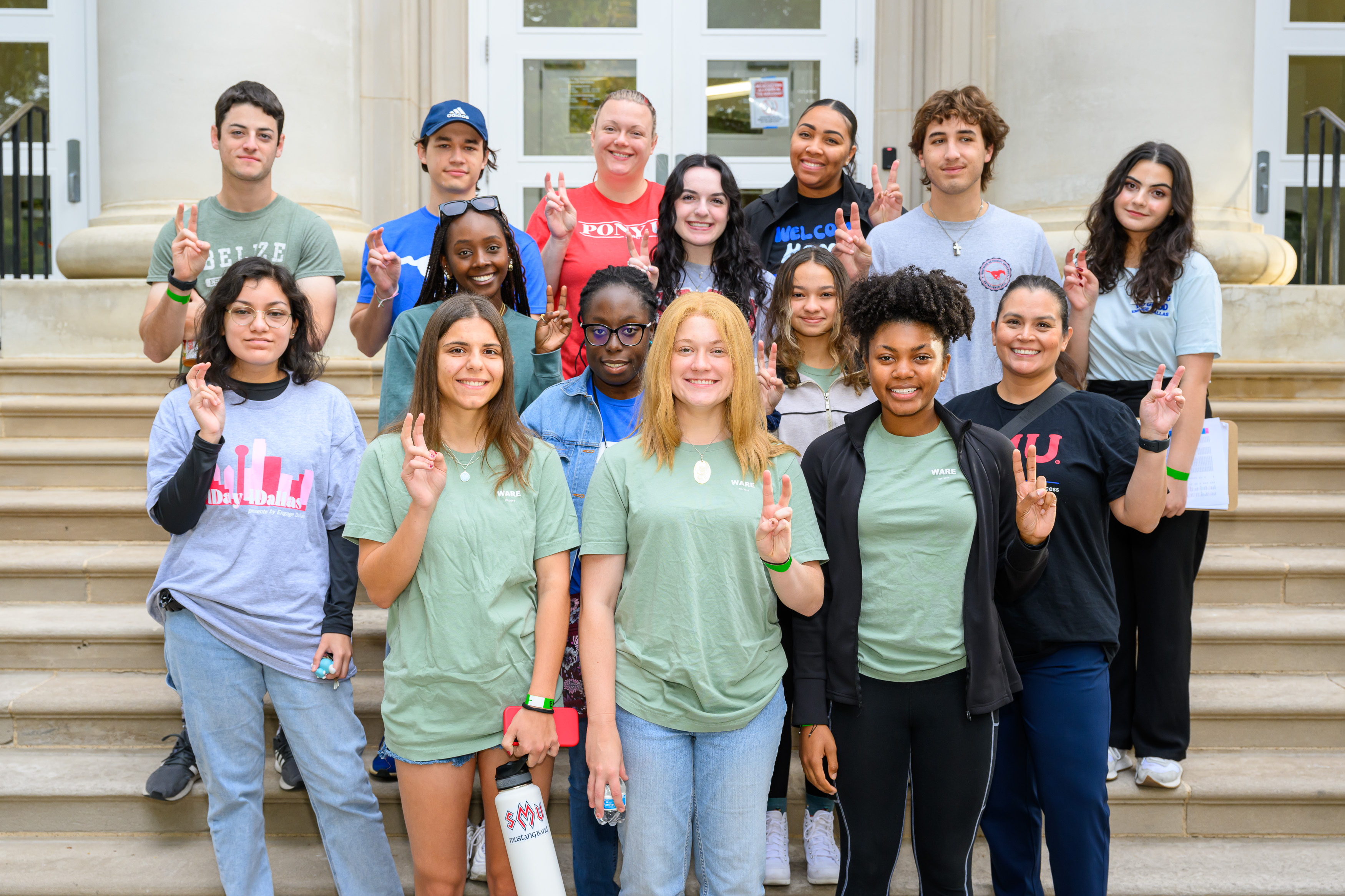 Engage Dallas volunteers gather on the steps.